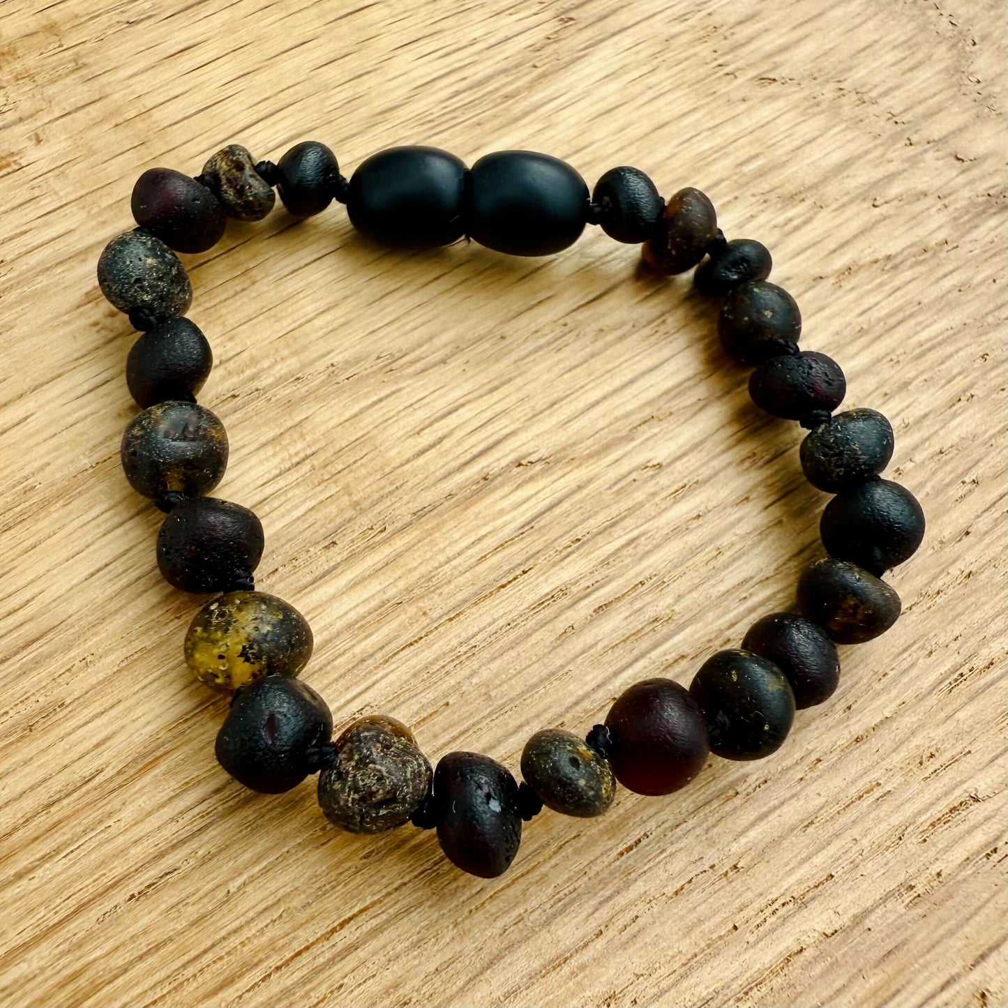 Green and Black Cherry Raw Amber Child Bracelet